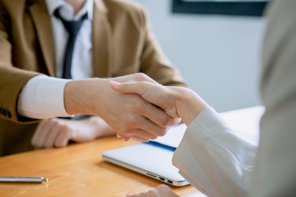 Business people shaking hands connection and partnership successful together.